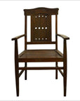 Brown wooden Indonesian Java chair with diamond cut-out backrest, shown on a white background.