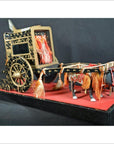 Gold and red Japanese lacquered festival carts on a vibrant red platform.