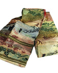 Close-up of Japanese silk sash with intricate green, gold, and pink patterns, available in various sizes.