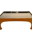 Glossy black and orange lacquered bamboo tea ceremony tray with curved legs, Taisho period, close-up.
