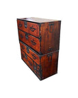 Brown Keyaki wood Isho-Dansu chest with metal handles, antique Japanese furniture against a white background.