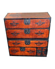 Brown Keyaki wood Isho-Dansu chest with black metal handles and four drawers, antique Japanese furniture.