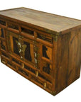 Brown wooden 19th-century Korean chest with butterfly brass hardware, angled on a white background.