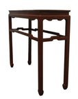 Black lacquered wood Asian altar table with four straight legs and decorative supports, vintage office decor setting.