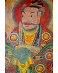 Colorful parchment painting featuring stern man in ornate robes with sword and red halo, Laotian art, close-up.