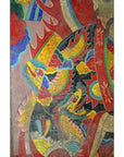 Colorful Laotian parchment painting of two dragons with clouds and red ribbons in a clear double plexiglass frame.
