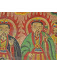 Colorful Laotian parchment painting featuring three crowned, haloed men in robes, close-up view.