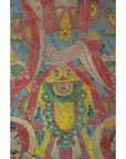 Red and green Laotian parchment painting, crossed hands, stylized face, close-up of artwork in good condition.