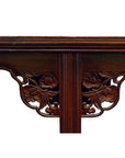 Close-up of dark stained antique elm wood with ornate floral carvings on Large Altar Table.