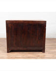 Two-toned burl and elm wood Chinese antique cabinet with doors on a wooden floor against a white wall indoors.