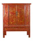 Red lacquer 19th century armoire with gilt décor, two doors, on a rectangular base.