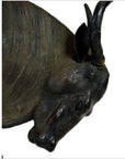 Close-up of a large leather gnu in good condition against a white background.