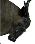 Close-up of a large leather gnu in good condition against a white background.