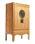 Natural wood Chinese armoire with double doors, metal medallion hardware, and decorative curved legs.