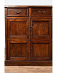 Brown teak wood cabinet with four drawers and four double doors, large size, set against a plain background.