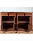 Brown teak wood cabinet with four drawers and four double doors, empty shelves visible inside.