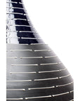 Close-up of a dark glossy ceramic Thai vase with horizontal white lines.