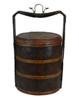 Brown wicker basket with lid, round and three-tiered, Chinese style, handle, intricate woven pattern, close-up.