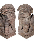 Gray stone Ming Dynasty lion statues with detailed manes, on square bases, 16th–17th century China.