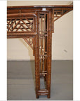 Close-up of warm brown bamboo altar table leg with intricate geometric lattice design.