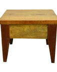 Brown mango wood side table with four legs and flat rectangular top, vintage-inspired design, studio background.