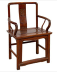 Brown wooden wedding chair with carved medallion and curved arms, Ming Dynasty style, classic design.