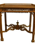 Brown wooden hand-carved table with lattice design and four straight legs, vintage style, indoor setting.