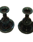 Green glazed ceramic antique Chinese Hunan candle holders, pair displayed side by side on white background.