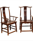 Brown wood Chinese Official's Hat Chairs from 1880s with carved splats and curved arms, side by side, front view.