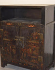 Black lacquer display cabinet with Asian motifs, two doors, metal lock, and open shelf, antique style.