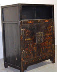 Black lacquered wood Chinese display cabinet with open shelves, metal latch, and two doors against white wall.