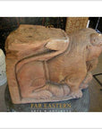 Brown wood Indian guardian lion carvings on display shelf at Far Eastern Arts & Antiques antique art gallery.