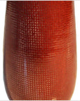 Close-up of reddish-brown ceramic vase with textured grid-like surface.