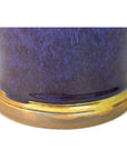 Close-up of glossy dark blue ceramic vase with brown base, in very good condition.