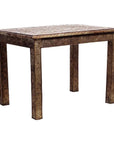 Rectangular hammered silver table with engraved patterns and legs, classic Indian style, close-up view.