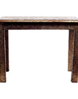 Silver hammered metal rectangular table with intricate carved legs and top, displayed on white background.