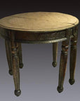 Nickel-silver demi-lune table with repousse vintage detailing and elegant carved legs, front view.