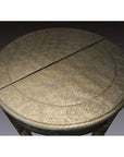 Silver nickel demi-lune table with repousse floral engravings and a visible split on the tabletop.