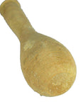 Light brown Roman Lacrimarium with rounded end, ceramic vessel on white background, close-up.