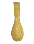 Brown clay Roman lacrimarium with a tall narrow neck and bulbous base, weathered surface, on white background.