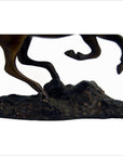 Bronze running horse sculpture close-up, 7.5"H x 11"L x 2"W, lower legs on textured base, very good condition.
