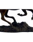 Bronze running horse sculpture close-up, 7.5"H x 11"L x 2"W, lower legs on textured base, very good condition.