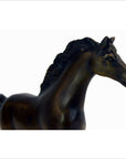 Close-up of bronze running horse sculpture on white background, 7.5 inches high by 11 inches long by 2 inches wide.
