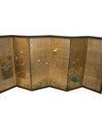 Gold leaf Japanese folding screen with painted cranes in flight and landscape, price tag visible.