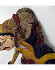 Brown wooden Indonesian Wayang Kulit shadow puppets with painted details, profile view on white background.