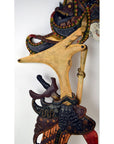 Set of three wooden Wayang Kulit Indonesian shadow puppets with intricate designs on a plain white background.