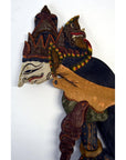 Colorful wooden Wayang Kulit Indonesian shadow puppets with intricate detailing, set of three.