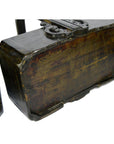 Close-up of brown elm wood box with metal hinges, featuring a well-preserved, weathered surface.