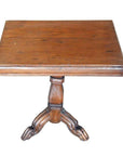Brown wooden Colonial tripod table with rectangular top and central pedestal base, natural patina finish.