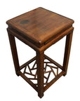 Brown wooden square side table with cracked ice textured base and geometric lower frame, close-up.